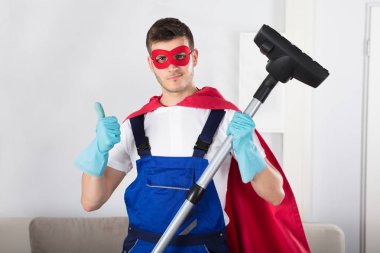 Süper kahraman Kapıcı ile elektrikli süpürge 
