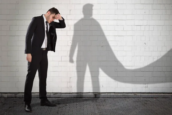 Empresário com sua sombra — Fotografia de Stock