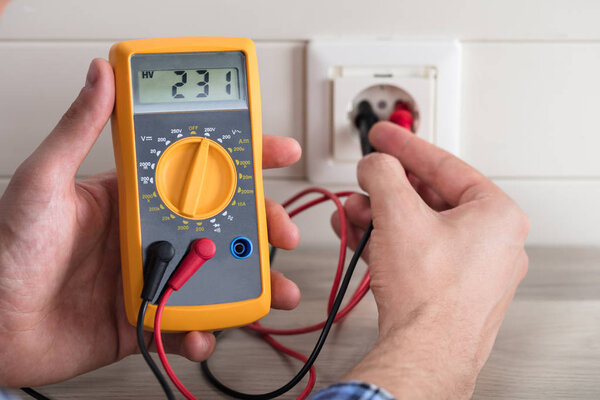 Electrician Checking Voltage 