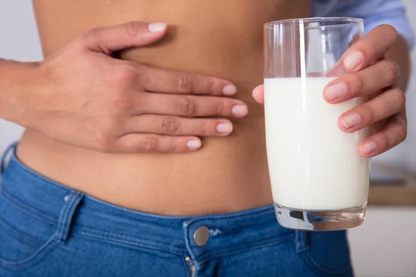 Woman Holding Glass Of Milk