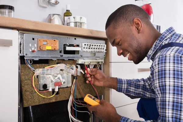 Technician Fixing Dishwasher — Stock Photo, Image