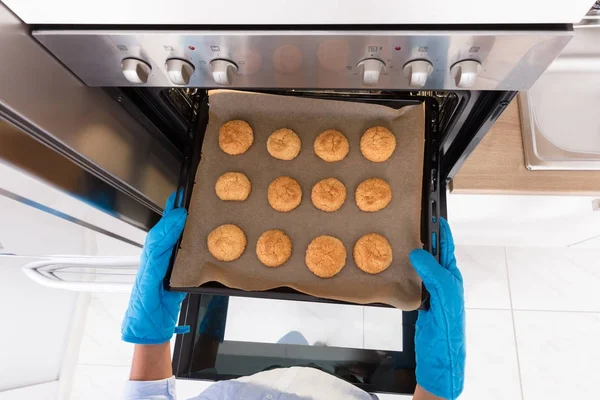 Human Hand Taking Out Tray — Stock Photo, Image