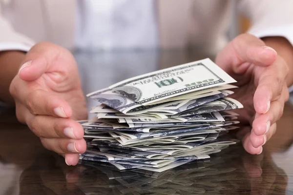 Businesswoman Protecting Dollar Bills — Stock Photo, Image