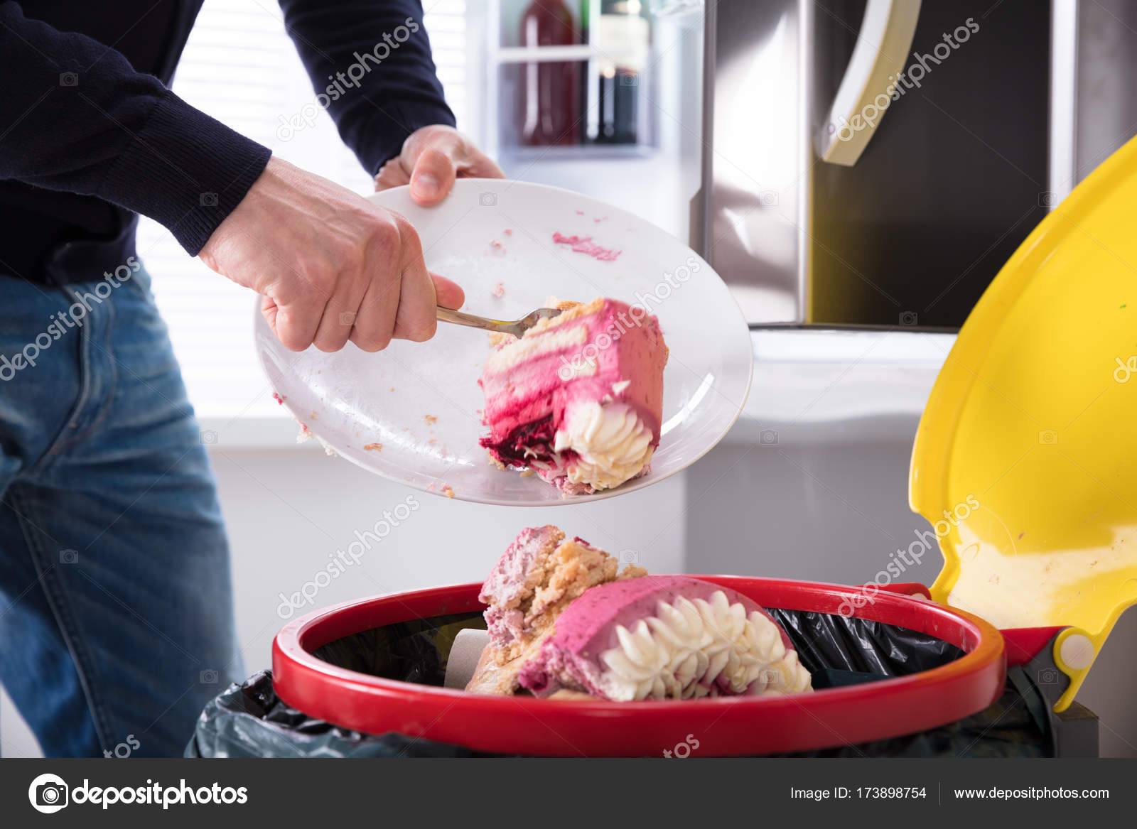 Person Throwing Cake In Trash Stock Photo by ©AndreyPopov 173898754