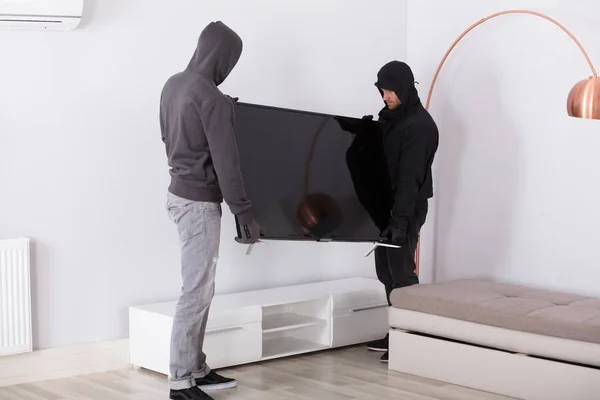 Robbers Stealing Television — Stock Photo, Image