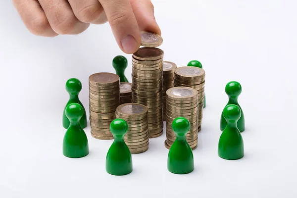 Businessperson Placing Coin — Stock Photo, Image