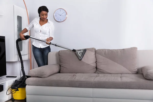 Woman Cleaning Sofa — Stock Photo, Image