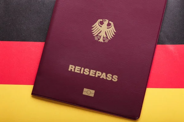 Passport On German Flag — Stock Photo, Image