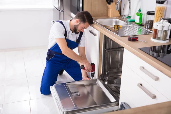 Technician Repairing Dishwasher — Stock Photo, Image