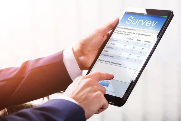 Businessperson Filling Online Survey — Stock Photo, Image