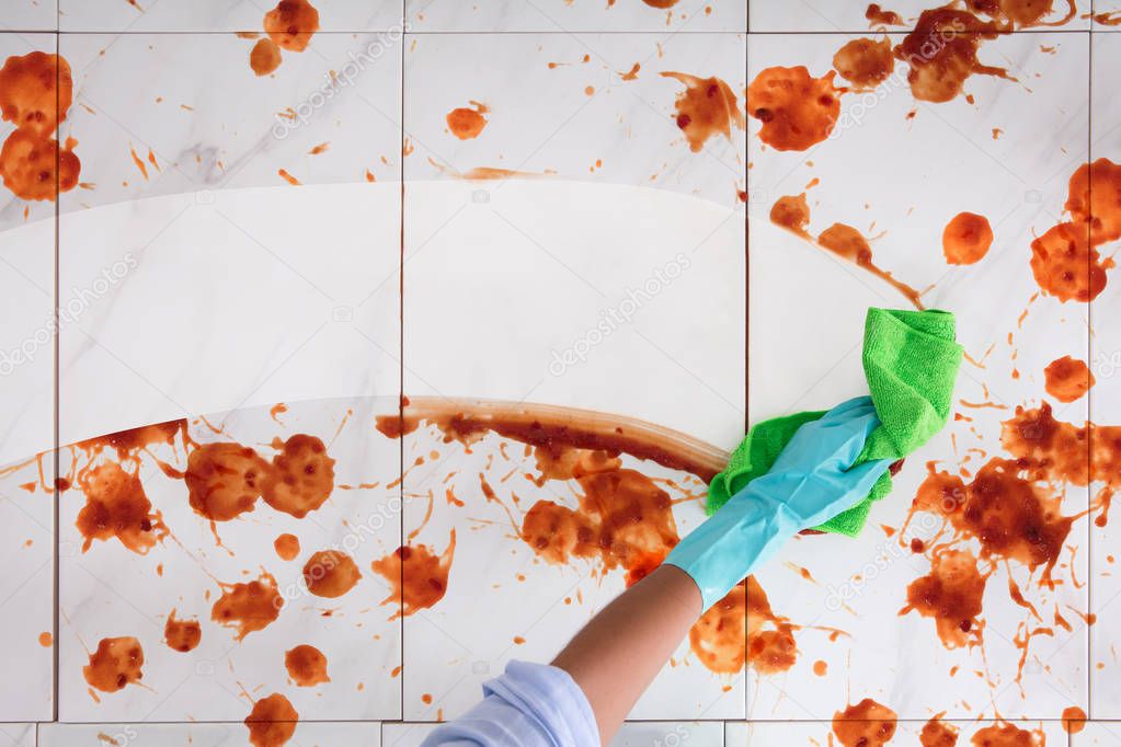 Person Cleaning Floor