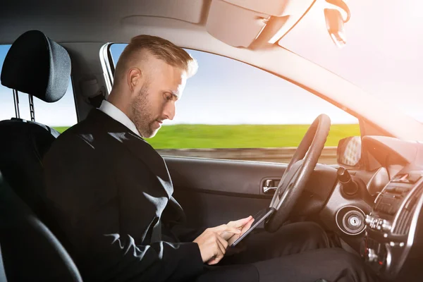 Businessman Sitting Inside Car — Stock Photo, Image