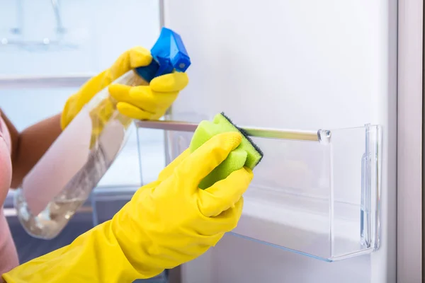 Woman's Hand Cleaning Refrigerator — Stock Photo, Image