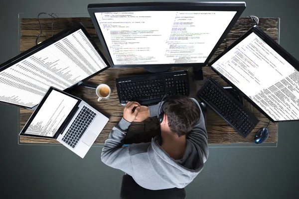 Hacker Using Multiple Computers — Stock Photo, Image
