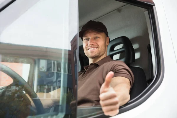 Delivery Man Sitting Inside Van