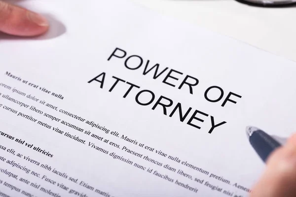 Close Person Holding Pen Power Attorney Form — Stock Photo, Image