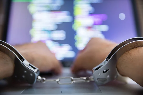 Close Person Hand Handcuff Using Laptop — Stock Photo, Image