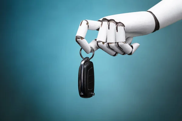 Turkuaz Arka Planda Bir Robot Araba Anahtarının Yakın Çekimi — Stok fotoğraf