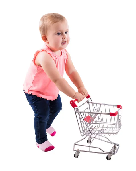 Baby Flicka Håller Små Kundvagnen Vit Bakgrund — Stockfoto