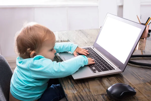 Baby Girl Using Laptop Blank White Screen — стоковое фото