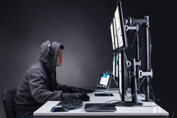 Rear View Hacker Using Multiple Computers Stealing Data Office — Stock Photo, Image