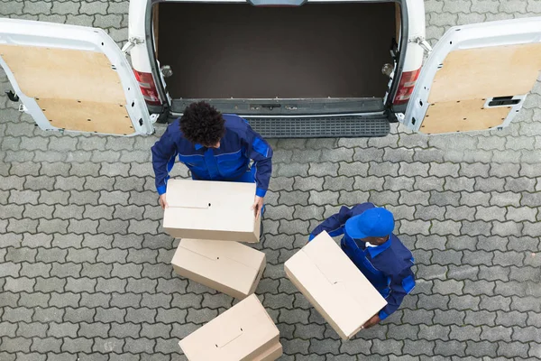 High Angle View Delivery Men Unloading Cardboard Boxes Truck — стоковое фото