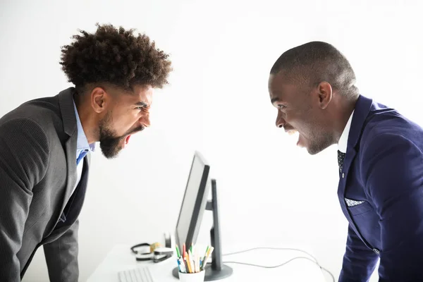 Two Angry Young Businessmen Shouting Each Other Workplace — Stock Photo, Image