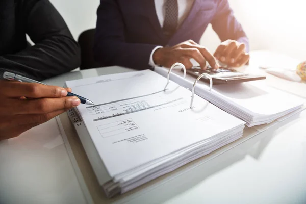 Two Businessman Calculating Bills Using Calculator Workplace — Stock Photo, Image