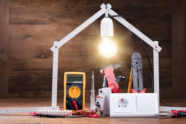 Repair Tools Illuminated House Made Measuring Tape Wooden Table — Stock Photo, Image