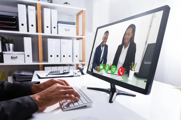 Close Businessperson Hand Video Conferencing Smiling Colleagues Computer Office — Stock Photo, Image