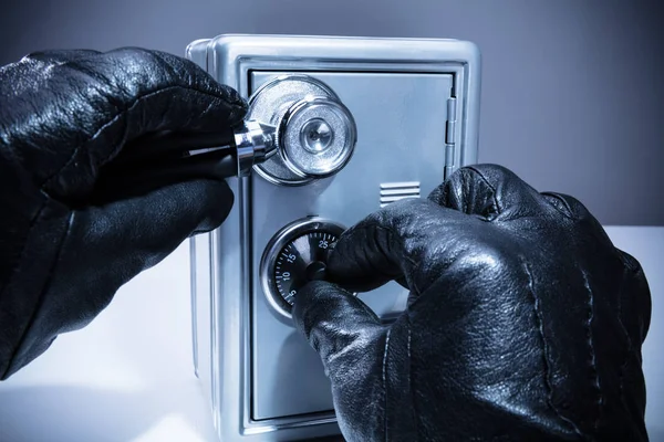 Close Thief Hand Using Stethoscope While Unlocking Safe — Stock Photo, Image