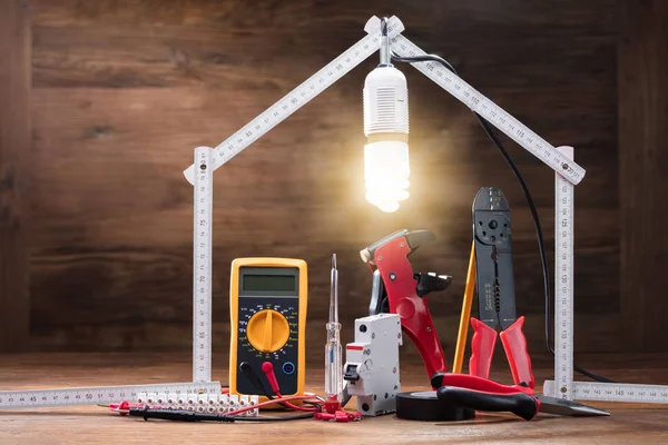 Repair Tools Illuminated House Made Measuring Tape Wooden Table — Stock Photo, Image