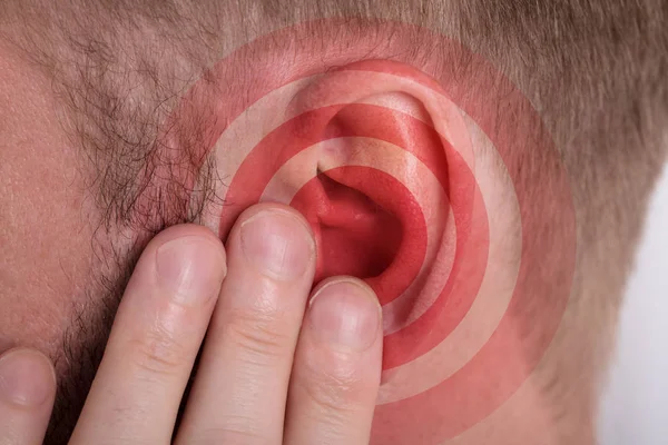 Close Red Circle Pattern Man Ear — Stock Photo, Image