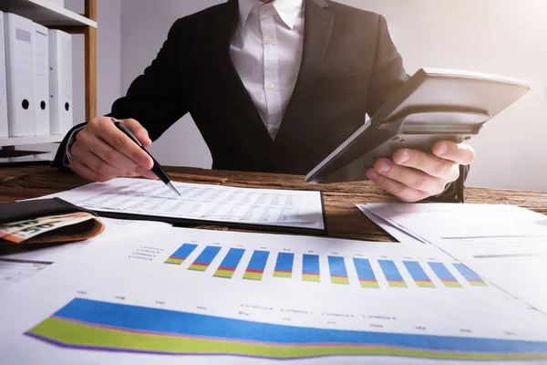 Businessperson Calculating Financial Report Graphs Wallet Wooden Desk — Stock Photo, Image