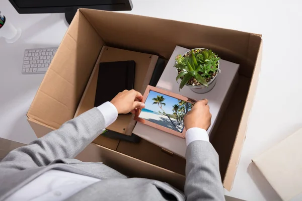 Close Businesswoman Packing Picture Frame Cardboard Box Workplace — Stok Foto