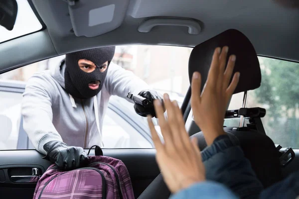 Thief Balaclava Threatening Woman Gun While Stealing Backpack Car — Stock Photo, Image