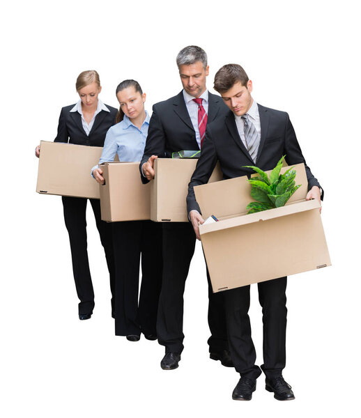 Unhappy Businesspeople Standing With Their Belongings In Cardboard Box Isolated On White Background