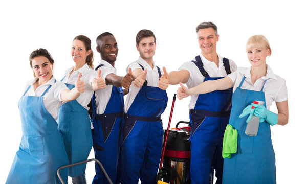 Portrait Of Smiling Janitors Gesturing Thumbs Up On White Background