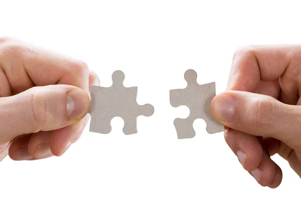 Close Human Hand Holding Jigsaw Puzzle White Background — Stock Photo, Image