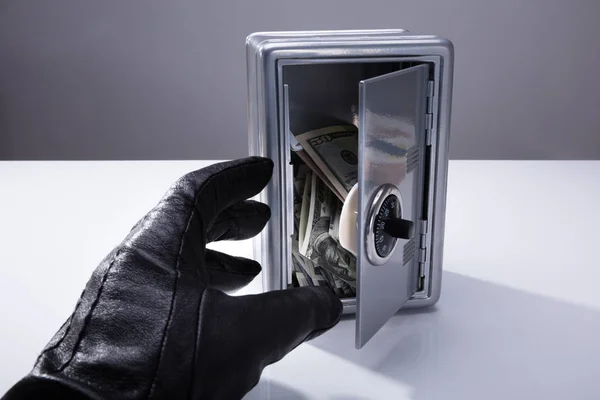 Close Thief Hand Wearing Gloves Stealing Banknotes Open Safe — Stock Photo, Image