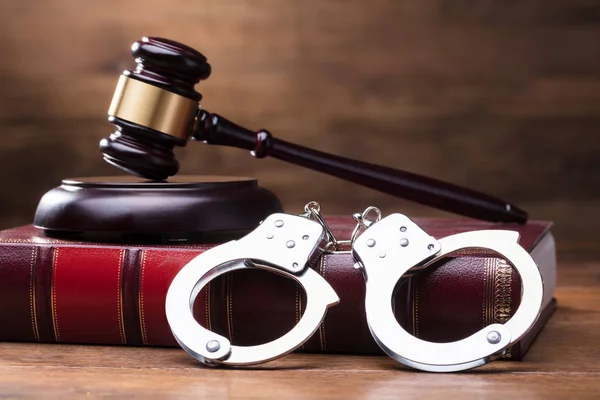 Gavel Handcuffs Law Book Wooden Table Background — Stock Photo, Image