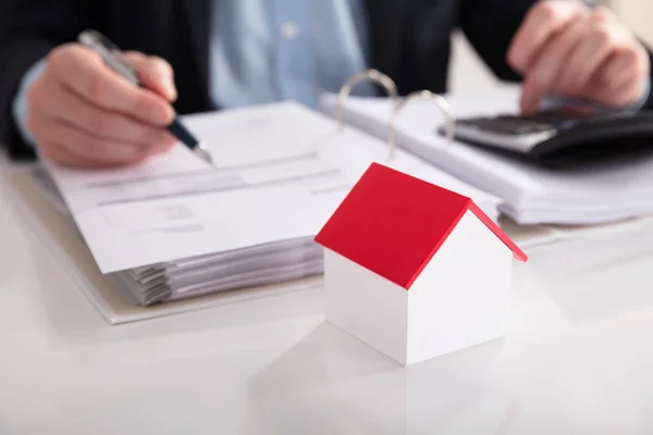 Close House Model Front Businessperson Calculating Bill Desk — Stock Photo, Image