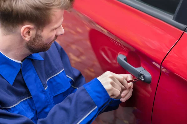 Close Human Hand Opening Red Car Door Lockpicker — Stock Photo, Image