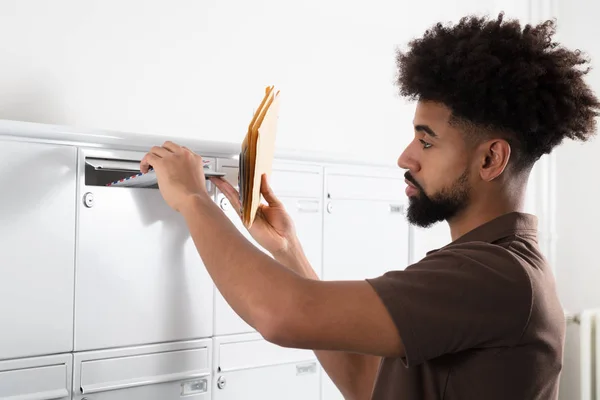 Side View Young Man Putting Letters Mailbox — Stock Photo, Image