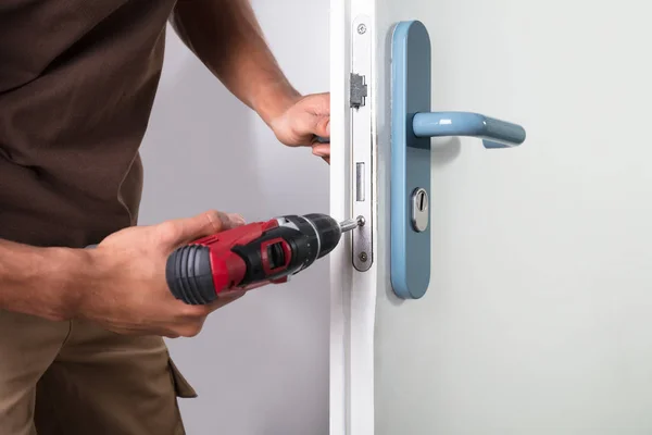 Carpenter Installing Door Lock Wireless Screwdriver — Stock Photo, Image