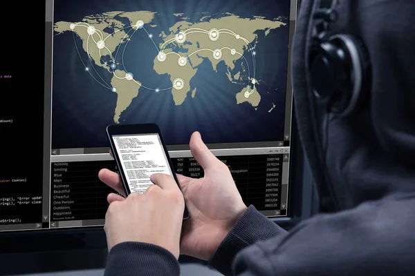 Hacker Using Mobile Phone Stealing Data Computer Screen Showing World — Stock Photo, Image