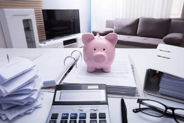 Close Piggybank Document Receipts Calculator White Desk — Stock Photo, Image