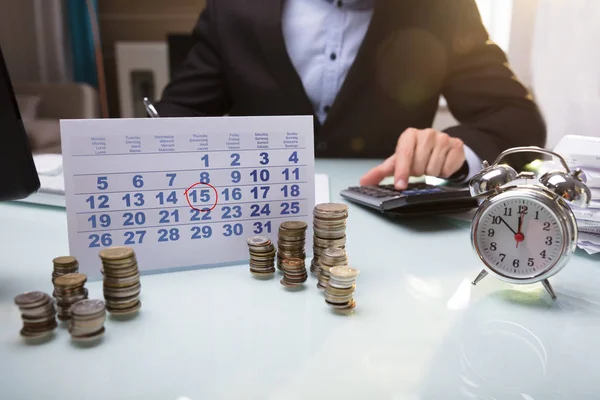 Close Stacked Coins Calendar Businessperson Hand Using Calculator — Stock Photo, Image