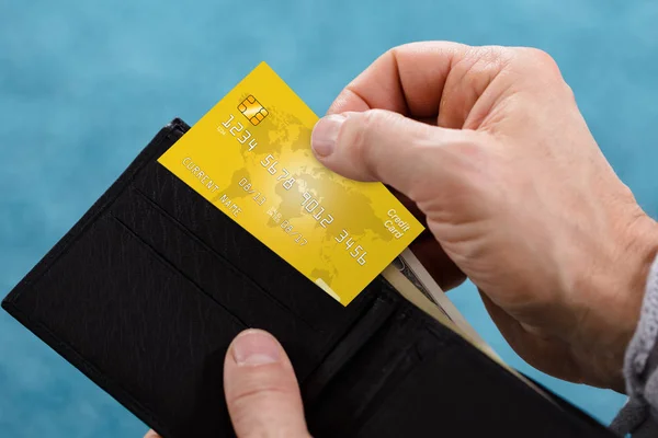 Close Person Hand Removing Yellow Credit Card Wallet — Stock Photo, Image