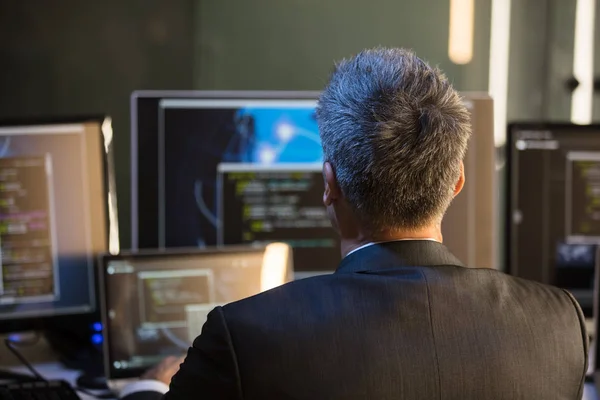 Rear View Businessman Looking Multiple Computer Screens Office — Stock Photo, Image